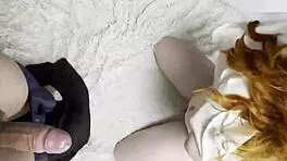 Red-haired vixen teases with wild sucking