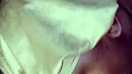 Side view of ebony bonnet working hard outdoors