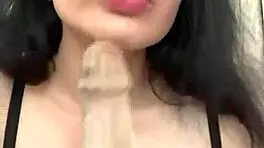 Cute student sucks big dildo toy passionately 😍