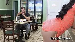Outdoor beauty is a public announcer that is giving a blowjob