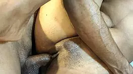 watch this couple fucking their shaved pussies hard