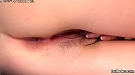 arousing chick teases her pink slit until she climaxes hard.