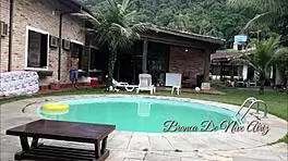 Young Brunette Joins Couple in Poolside Threesome