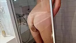 horny milf shoves dildo deep in shower