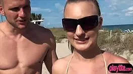 Threesome: A young couple has a romantic scene of marriage when making love inside a car