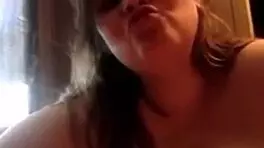 Big boobed young wife earns money by giving handjob