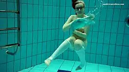 Russian teen Dasha in the bathtub: a play in water