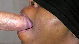 Black stunning girl takes cum in deepthroating scene