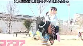 Young Japanese teen playing in the park