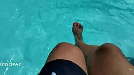 Feet in Pool with Lots of Water