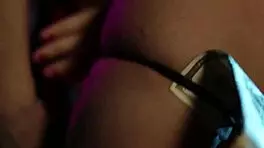 Old women is giving young women a hand job with her fingers