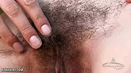 Aislynn Teases with Her Hairy Pussy Swinging Wide Open.