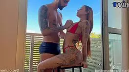 Rumulo Pontess and the girl he is dating go for a kiss while seated around swimming pool within their rented condo