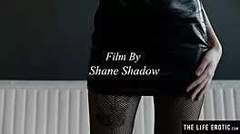 Cute russian babe peels off fishnet pantyhose to masturbate her hairless pussy