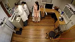 Young silent woman gets a diseases check up at a medical clinic for ladies