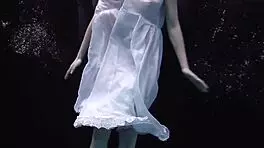 Andrejka SHOWCASES stunning UNDERWATER moves in BIKINI at BEACH pool