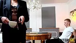 Mature Teacher Seduces Young Man In Classroom