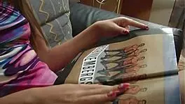 high class babe masturbates pussy with dildo after reading magazine