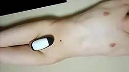 Teen masturbates intensely with rotor.