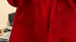 brunette in red lingerie plays with herself