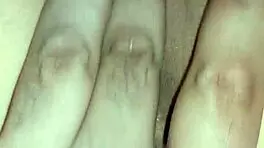 Fingering tight Asian pussy.