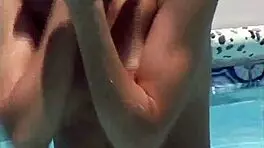 Lesbian girls engage in outdoor pool activities