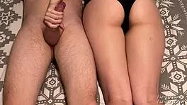 Blonde girlfriend with a curvy body gives a handjob