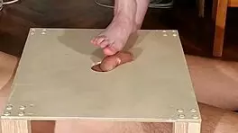 Young goth Domina's footjob and cock stomping in HD video