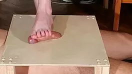 Young goth Domina's footjob and cock stomping in HD video