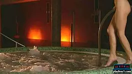 A young beautiful girl named Sea Rose is chilling naked in a hot tub