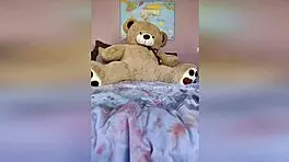 girl teases fan by getting naked gradually.