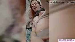 A girl with glasses played a tease in front of the camera