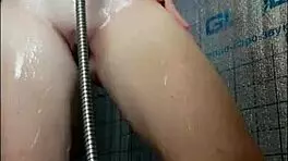Horny teen shaves wet pussy in shower
