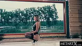 Beautiful teen in leather and stockings fingers her clit to orgasm.