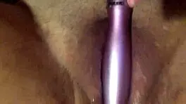 Eighteen year old fingers her wet pussy and fucks herself solo