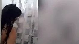 Cute Latina Showers Under Webcam, Revealing Tattooed Body And Tits