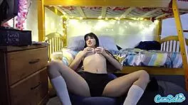 Teen lesbian coed massaging pussy in dorm for camsoda 😘