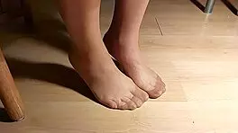 this compilation showcases outstanding feet in suntanned pantyhose