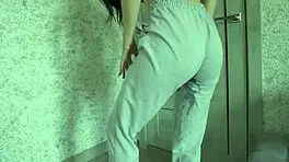 Petite teen experiences desperation pee in homemade video