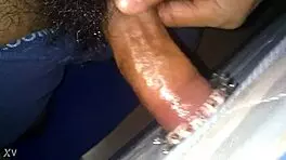 He was alone in his room, slowly stroking his cock with a rubber toy until climax.