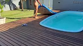 Friend Visits Beach House For Pool Swim