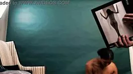 Exotic hottie spreads pussy for photographer