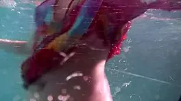 Redhead Nikita Vodorezova Takes A Quick Bath Underwater