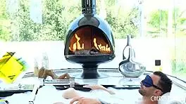 petite blonde girl braylin bailey relaxes in hot tub