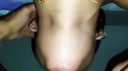 young girl eagerly takes on swallowing challenge