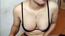 Young shemale masturbates her big cock