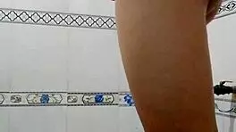 Detailed scene of a person bathing alone in private setting