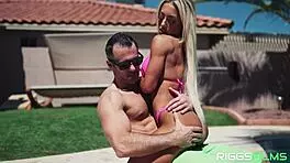 Is this ripped blonde model getting fucked by the pool?