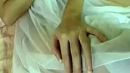 Asian babe sucks cock while toyed