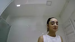 Hot Brunette College Girl With A Mini Tennis Skirt And Over Knee Socks In The Bathroom Shows Panties Under Her Short Skirt And Goes Also No Panties